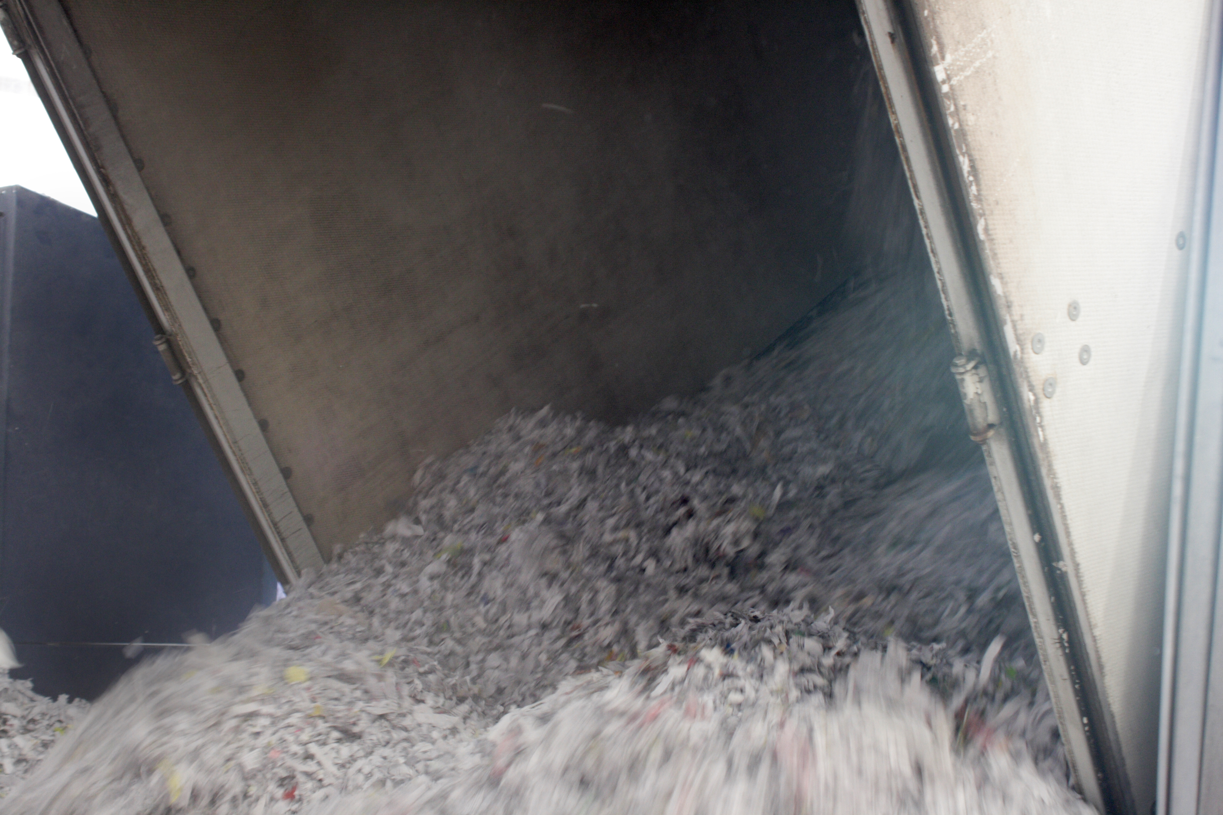 Marshall Shredding truck providing secure document destruction services at a Texas business location
