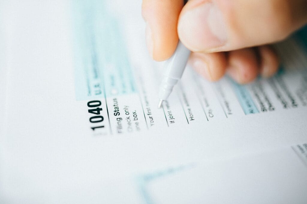 Confidential financial and tax documents being completed
