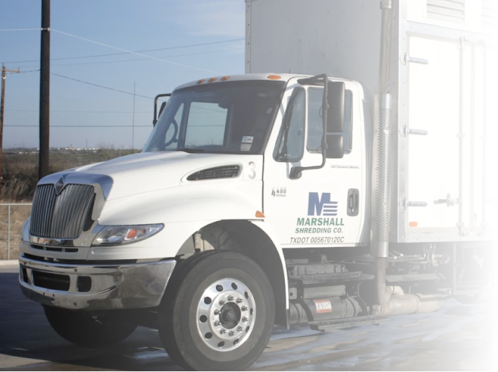 Marshall Shredding driver shredding documents on-site at a business