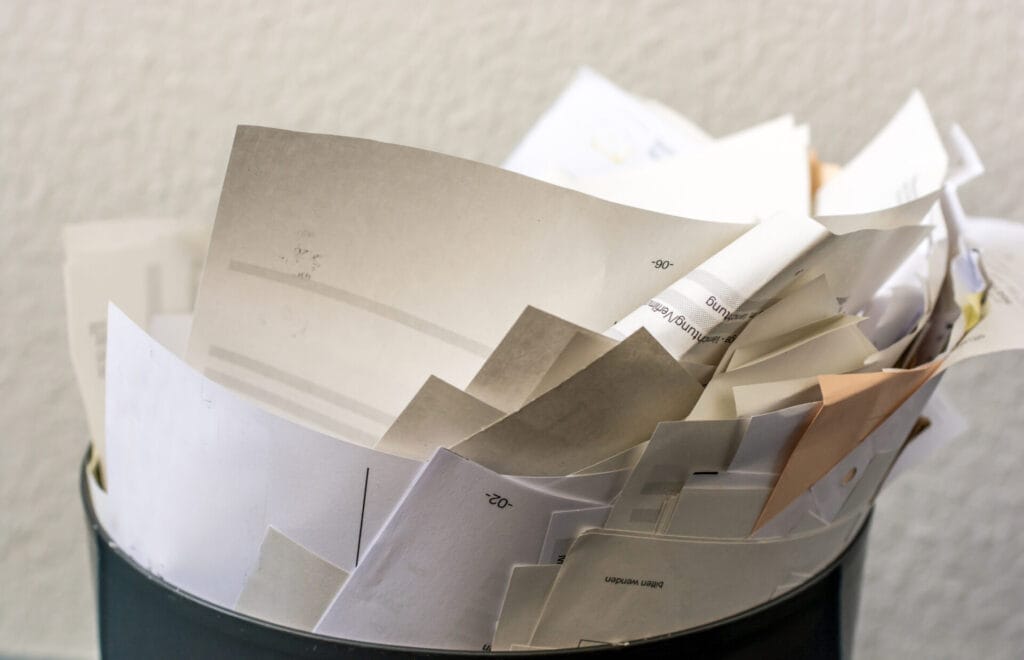 Overcrowded trash in an office waiting for on-site shredding in San Antonio